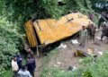 Driver killed, two injured after school bus plunges into gorge in Budgam
