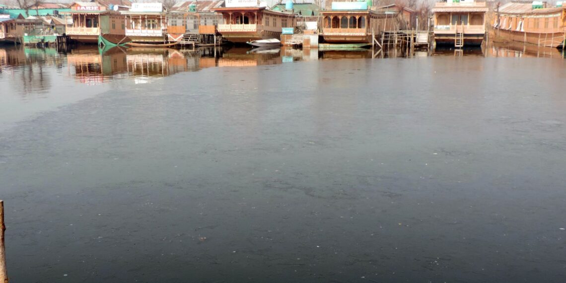 The water of world famous Dal lake freezes partially as minimum temperature plunges to minus 5.2 degree celsius in Srinagar