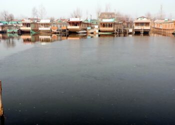 The water of world famous Dal lake freezes partially as minimum temperature plunges to minus 5.2 degree celsius in Srinagar