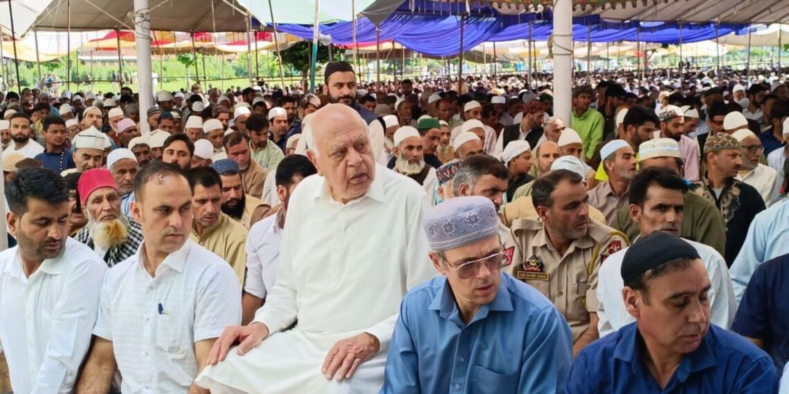 Muslim devotees offering prayers on the occasion of Eid-al-Adha, at Hazratbal shrine in Srinagar