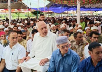 Muslim devotees offering prayers on the occasion of Eid-al-Adha, at Hazratbal shrine in Srinagar