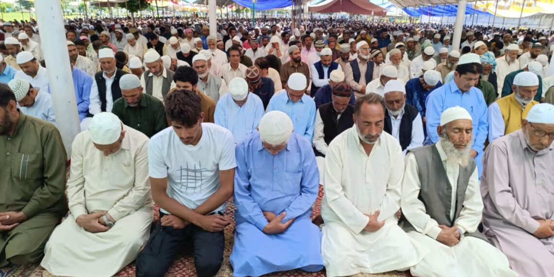 Muslim devotees offering prayers on the occasion of Eid-al-Adha, at Hazratbal shrine in Srinagar