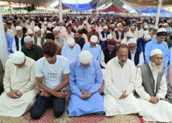 Muslim devotees offering prayers on the occasion of Eid-al-Adha, at Hazratbal shrine in Srinagar