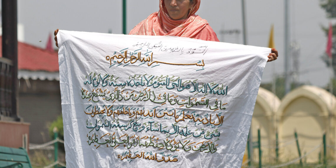 Shaheena Banoo from Kulgam prepares a shawl embossed with ‘Ayat-ul-Kursi’ in seven days.
