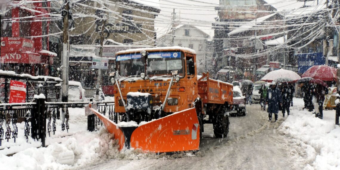 Snow clearance operation in progress in Srinagar as heavy snow fall disrupting the normal life on Tuesday