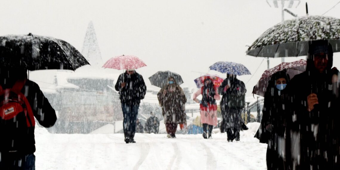 Srinagar received heavy snow fall disrupting the normal life on Tuesday