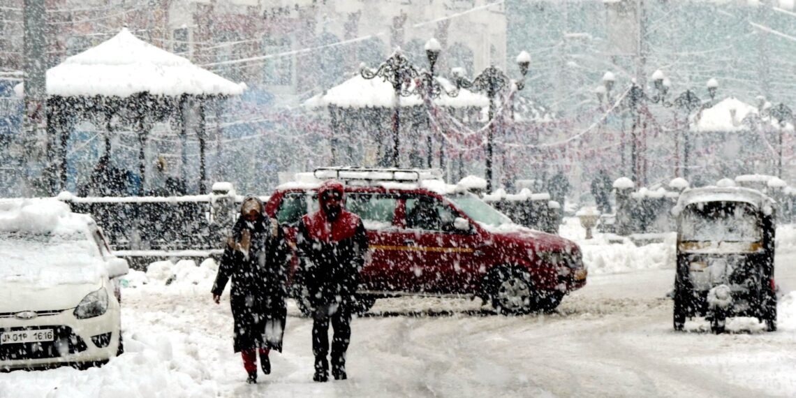 Srinagar received heavy snow fall disrupting the normal life on Tuesday