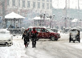 Srinagar received heavy snow fall disrupting the normal life on Tuesday