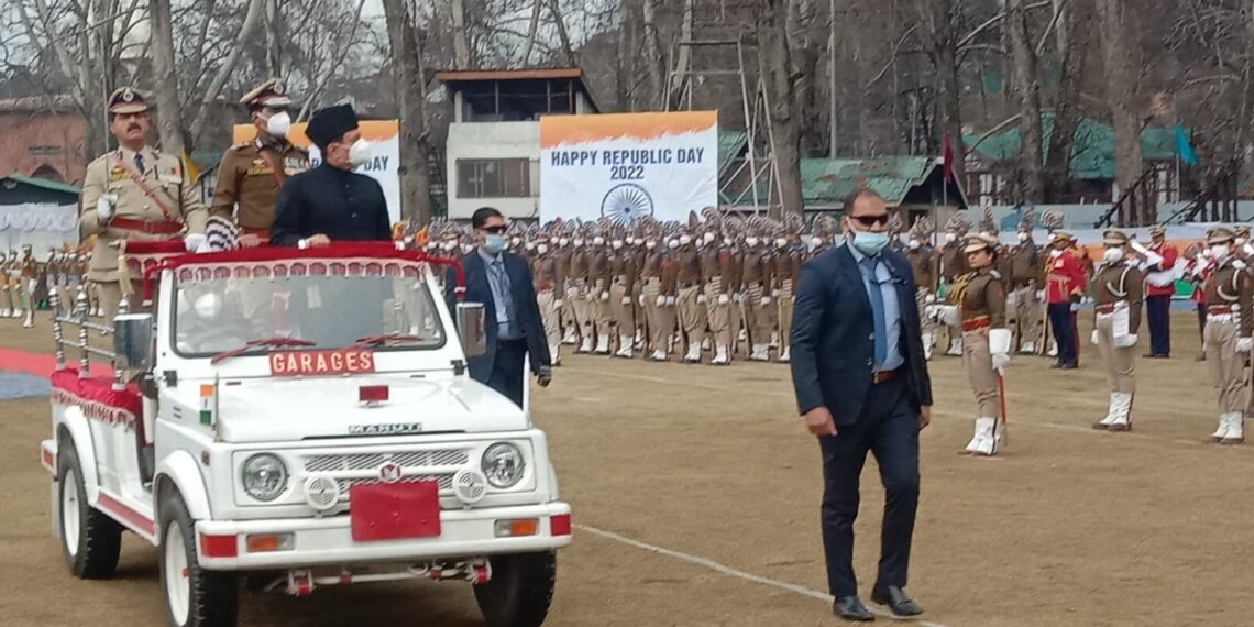 Advisor Bhatnagar unfurls National Flag on Republic Day at SK Stadium, Srinagar