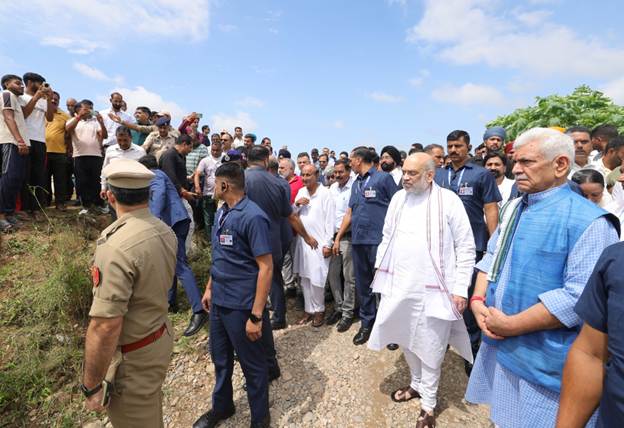 Modi led Govt stands firmly with flood hit J&K people: Amit Shah