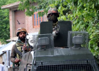 Army personnel at the encounter site in Khanday Pora in Kulgam
