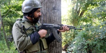 Army personnel at the encounter site in Khanday Pora in Kulgam