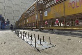 Farmers protests: Delhi Police cement nails, barricade border protest sites with barbed wires