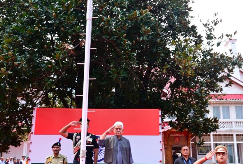 LG Manoj Sinha Hoists Tricolour at Lok Bhavan, Pays Tribute to Freedom Fighters
