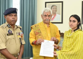 LG Manoj Sinha hands over Job letter to Wife of slain SI Deepak Sharma