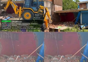 Police demolish Illegally acquired commercial property of drug peddler in Baramulla