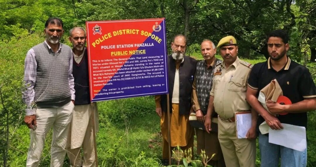 Police attach Immovable Property of Proclaimed Offender Linked with Hizbul Mujahideen terror outfit
