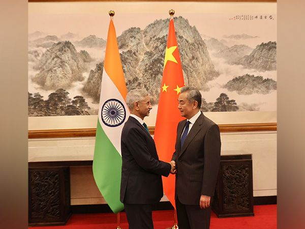 EAM Jaishankar Reviews India China Ties With Wang Yi In Beijing
