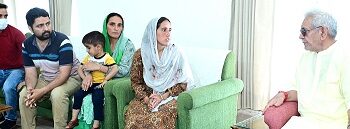 Lt Governor meets family members of  Sanjay Sharma killed by militants in February this year