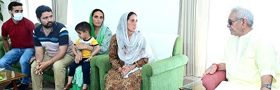 Lt Governor meets family members of Sanjay Sharma killed by militants in February this year