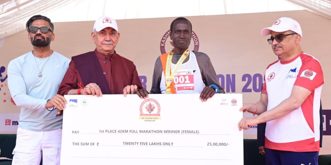 LG Sinha felicitates the winners of the first-ever International Marathon in J&K