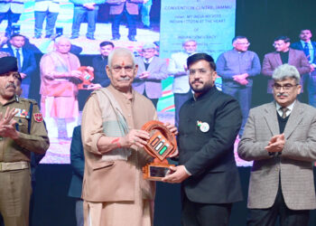 LG Sinha felicitates DC Rajouri Abhishek Sharma with Appreciation Award for exemplary Election Management