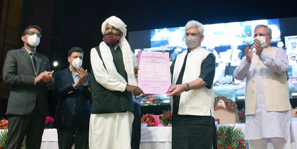 LG hands over Forest Rights Certificates to tribal community members of Jammu Divn