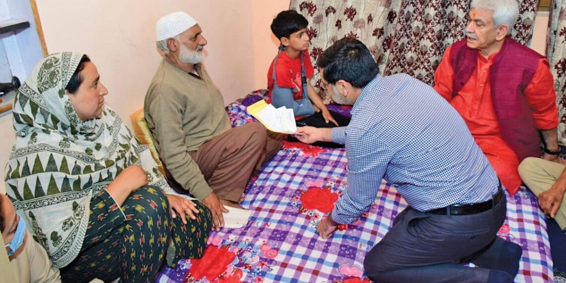 LG Sinha visits family of slain cop & home of slain TV artist