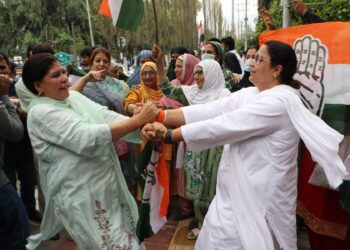 National Conference & Congress workers celebrating outside SKICC counting centre Srinagar