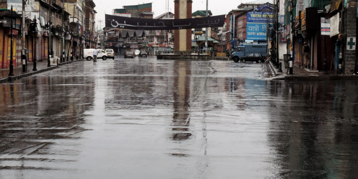 Lal Chowk wore a deserted look as shutdown amid heavy rains crippled normal life on Sunday, August 15 in Srinagar