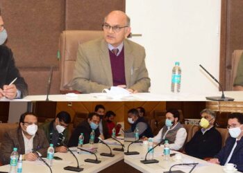 State Election Commissioner K K Sharma taking brief from J&K Deputy Commissioner on DDC polls