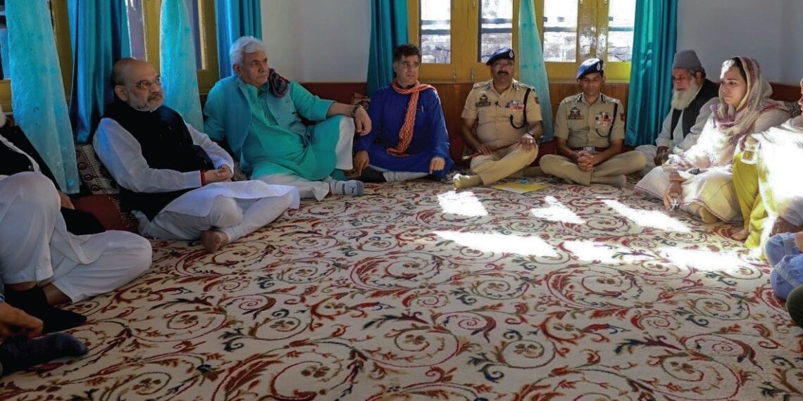 HM Shah visits family of slain cop in Uri