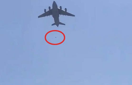Video shows Afghans who clung to plane falling off from sky as flight takes off from Kabul