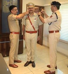ADGP Armed decorates newly promoted officer with ranks