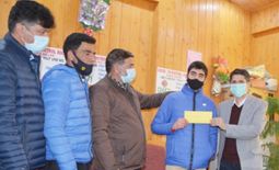 Distt Admin Shopian felicitates 10th Class Topper