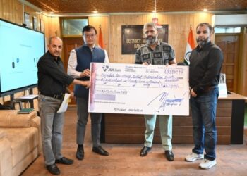 DC B’la hands-over cheque for additional nutrition support to TB patients