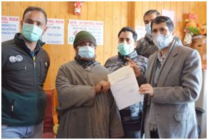 District Admin Shopian hands-over 2nd installment of Rs. 50,000 to Acid attack survivor