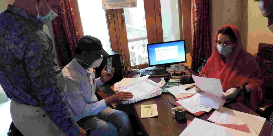 BACK TO OFFICE: Employees at a govt office working in Srinagar