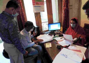 BACK TO OFFICE: Employees at a govt office working in Srinagar