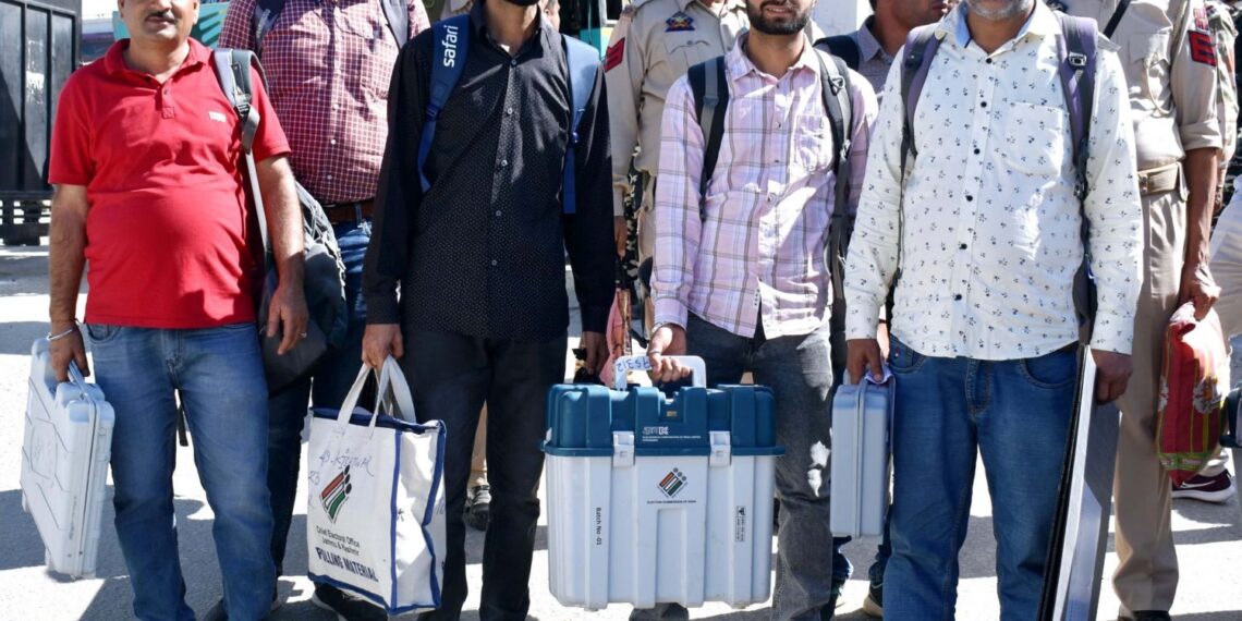 Polling officials leaving for respective polling stations ahead of first phase of Assembly election, in Kishtwar