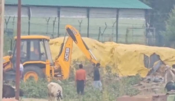 Authorities demolish illegal shed built by Afzal Guru’s relatives in Sopore
