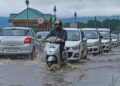 Few hours of rains turn Srinagar streets into virtual pools