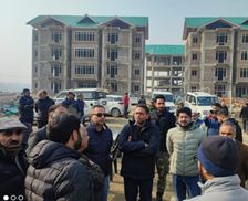 Secy DMRRR inspects construction work on quarters for KP employees at Shopian