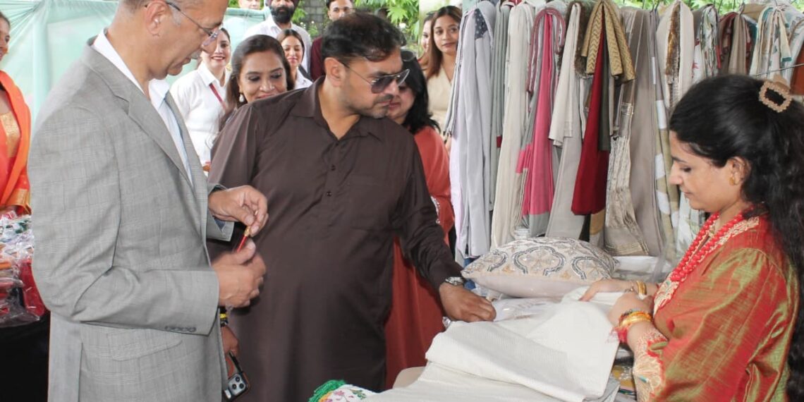 Satish Sharma pitches for promotion of indigenous products at Maple, Ivy Flea Market in Srinagar