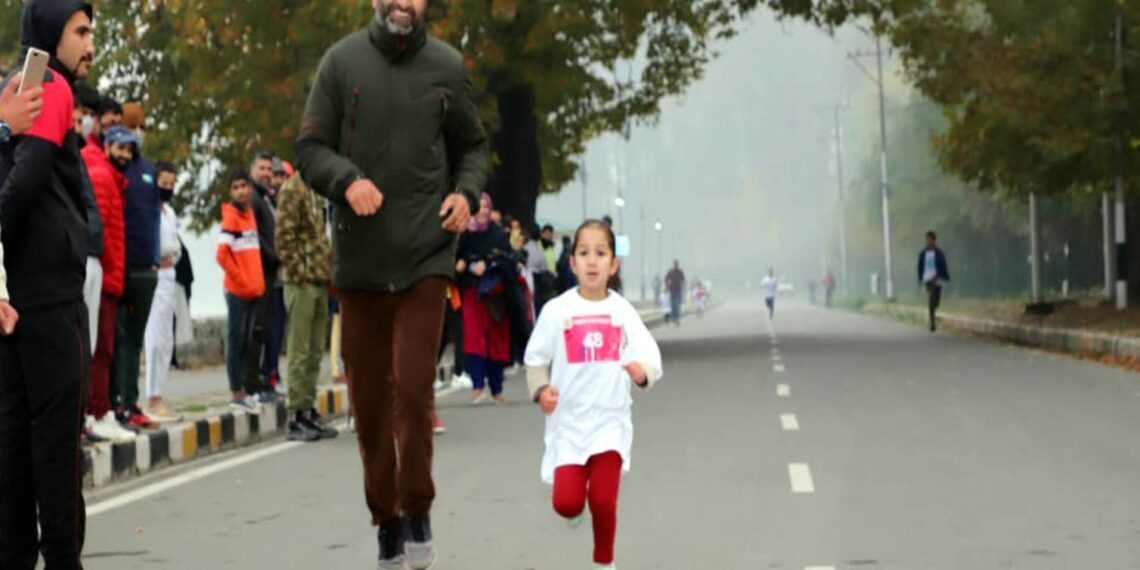 A kid among the participants during the “Run for Unity”
