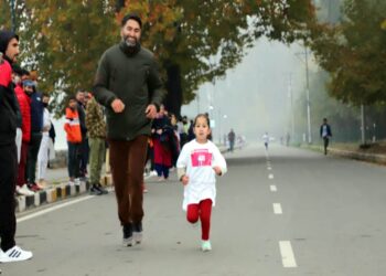 A kid among the participants during the “Run for Unity”